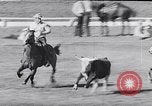 Image of cowboys at rodeo Pendleton Oregon USA, 1953, second 51 stock footage video 65675040164