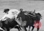 Image of cowboys at rodeo Pendleton Oregon USA, 1953, second 54 stock footage video 65675040164