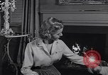 Standbild 1950s American family mode United States USA, 1954, aus Sekunde 36 historischem Filmmaterial Videoclip 65675040177