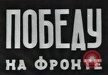 Standbild Sowjetische Bergleute bewegen Chunks von Kohle auf Förderbändern Russland, 1941, aus Sekunde 9 historischem Filmmaterial Videoclip 65675040193