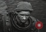 Image of Soviet soldiers use cables to recover German aircraft wreckage from a river Soviet Union, 1941, second 8 stock footage video 65675040198