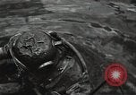 Image of Soviet soldiers use cables to recover German aircraft wreckage from a river Soviet Union, 1941, second 15 stock footage video 65675040198