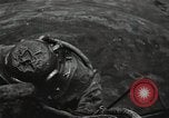 Image of Soviet soldiers use cables to recover German aircraft wreckage from a river Soviet Union, 1941, second 17 stock footage video 65675040198