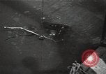 Image of Soviet soldiers use cables to recover German aircraft wreckage from a river Soviet Union, 1941, second 20 stock footage video 65675040198