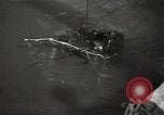 Image of Soviet soldiers use cables to recover German aircraft wreckage from a river Soviet Union, 1941, second 21 stock footage video 65675040198