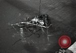 Image of Soviet soldiers use cables to recover German aircraft wreckage from a river Soviet Union, 1941, second 23 stock footage video 65675040198