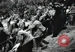 Image of Soviet soldiers use cables to recover German aircraft wreckage from a river Soviet Union, 1941, second 28 stock footage video 65675040198