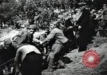 Image of Soviet soldiers use cables to recover German aircraft wreckage from a river Soviet Union, 1941, second 29 stock footage video 65675040198