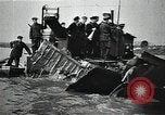 Image of Soviet soldiers use cables to recover German aircraft wreckage from a river Soviet Union, 1941, second 31 stock footage video 65675040198