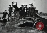 Image of Soviet soldiers use cables to recover German aircraft wreckage from a river Soviet Union, 1941, second 32 stock footage video 65675040198