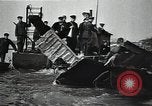 Image of Soviet soldiers use cables to recover German aircraft wreckage from a river Soviet Union, 1941, second 33 stock footage video 65675040198