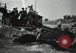 Image of Soviet soldiers use cables to recover German aircraft wreckage from a river Soviet Union, 1941, second 35 stock footage video 65675040198