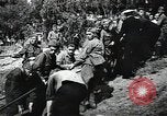 Image of Soviet soldiers use cables to recover German aircraft wreckage from a river Soviet Union, 1941, second 36 stock footage video 65675040198