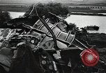 Image of Soviet soldiers use cables to recover German aircraft wreckage from a river Soviet Union, 1941, second 44 stock footage video 65675040198