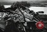 Image of Soviet soldiers use cables to recover German aircraft wreckage from a river Soviet Union, 1941, second 45 stock footage video 65675040198