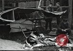 Image of Soviet soldiers use cables to recover German aircraft wreckage from a river Soviet Union, 1941, second 50 stock footage video 65675040198