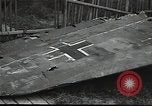 Image of Soviet soldiers use cables to recover German aircraft wreckage from a river Soviet Union, 1941, second 52 stock footage video 65675040198