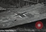 Image of Soviet soldiers use cables to recover German aircraft wreckage from a river Soviet Union, 1941, second 53 stock footage video 65675040198