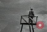 Image of Elderly Soviet men stand guard in rural village Soviet Union, 1941, second 27 stock footage video 65675040200