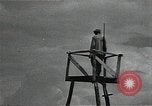 Image of Elderly Soviet men stand guard in rural village Soviet Union, 1941, second 28 stock footage video 65675040200