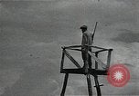Image of Elderly Soviet men stand guard in rural village Soviet Union, 1941, second 29 stock footage video 65675040200