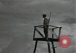 Image of Elderly Soviet men stand guard in rural village Soviet Union, 1941, second 30 stock footage video 65675040200