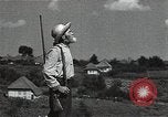 Image of Elderly Soviet men stand guard in rural village Soviet Union, 1941, second 38 stock footage video 65675040200