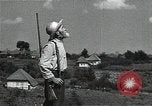 Image of Elderly Soviet men stand guard in rural village Soviet Union, 1941, second 39 stock footage video 65675040200