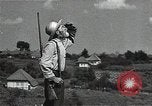 Image of Elderly Soviet men stand guard in rural village Soviet Union, 1941, second 40 stock footage video 65675040200