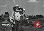 Image of Elderly Soviet men stand guard in rural village Soviet Union, 1941, second 42 stock footage video 65675040200
