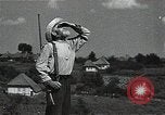 Image of Elderly Soviet men stand guard in rural village Soviet Union, 1941, second 48 stock footage video 65675040200