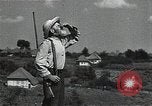 Image of Elderly Soviet men stand guard in rural village Soviet Union, 1941, second 49 stock footage video 65675040200