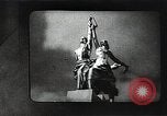Image of Statue of Soviet worker and a collective farm woman raising a hammer and sickle over their heads Eastern Front European Theater, 1941, second 14 stock footage video 65675040205