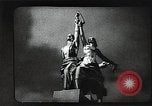 Image of Statue of Soviet worker and a collective farm woman raising a hammer and sickle over their heads Eastern Front European Theater, 1941, second 15 stock footage video 65675040205