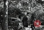 Image of Statue of Soviet worker and a collective farm woman raising a hammer and sickle over their heads Eastern Front European Theater, 1941, second 52 stock footage video 65675040205