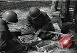 Image of Statue of Soviet worker and a collective farm woman raising a hammer and sickle over their heads Eastern Front European Theater, 1941, second 59 stock footage video 65675040205