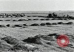 Image of Soviet farmers harvest wheat during World War 2 Soviet Union, 1941, second 10 stock footage video 65675040210