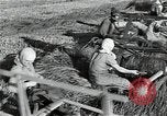 Image of Soviet farmers harvest wheat during World War 2 Soviet Union, 1941, second 16 stock footage video 65675040210