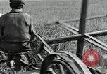 Image of Soviet farmers harvest wheat during World War 2 Soviet Union, 1941, second 18 stock footage video 65675040210