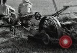 Image of Soviet farmers harvest wheat during World War 2 Soviet Union, 1941, second 22 stock footage video 65675040210