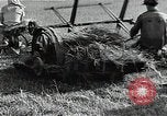 Image of Soviet farmers harvest wheat during World War 2 Soviet Union, 1941, second 23 stock footage video 65675040210