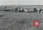 Image of Soviet farmers harvest wheat during World War 2 Soviet Union, 1941, second 28 stock footage video 65675040210