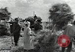Image of Soviet farmers harvest wheat during World War 2 Soviet Union, 1941, second 36 stock footage video 65675040210
