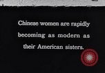 Standbild Verwestlichung Chinas zeigt Frauen shopping und arbeiten China, 1937, aus Sekunde 1 historischem Filmmaterial Videoclip 65675040305