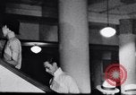 Standbild Verwestlichung Chinas zeigt Frauen shopping und arbeiten China, 1937, aus Sekunde 16 historischem Filmmaterial Videoclip 65675040305