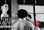 Standbild Verwestlichung Chinas zeigt Frauen shopping und arbeiten China, 1937, aus Sekunde 48 historischem Filmmaterial Videoclip 65675040305
