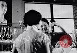 Standbild Verwestlichung Chinas zeigt Frauen shopping und arbeiten China, 1937, aus Sekunde 50 historischem Filmmaterial Videoclip 65675040305