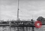 Image of Wooden perahu pinisi cargo boats under sail  Jakarta Indonesia, 1947, second 56 stock footage video 65675040309