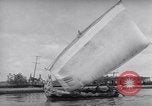 Image of Wooden perahu pinisi cargo boats under sail  Jakarta Indonesia, 1947, second 60 stock footage video 65675040309