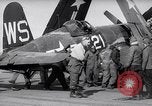 Image of F4U airplanes being moved on USS Badoeng Strait (CVE – 116) Pacific Ocean, 1950, second 26 stock footage video 65675040316